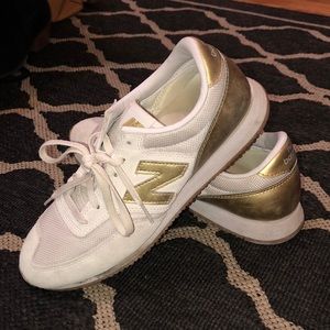 Gold New Balance Sneakers